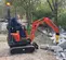 Yellow and Black EPIROC Mini Hydraulic Breaker Attachment for Skid Steer