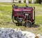 Red and gray HONDA 6,500-6,900 W Portable Generator, Gas